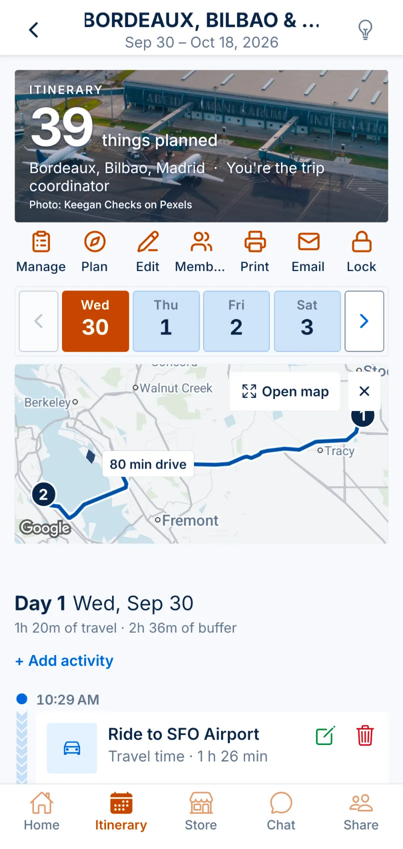 TourGuid itinerary: a trip header, day picker, driving route map and the first activity of day one.